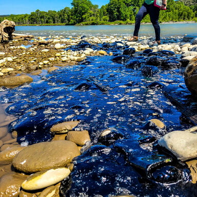 Cleanup begins after asphalt binder spill into Montana's Yellowstone River after train derailment