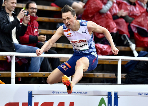 Olympic champion Warholm boos protesters on track who disrupted his 400-meter hurdles race