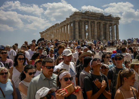 Tourists are packing European hotspots. And Americans don't mind the higher prices and crowds