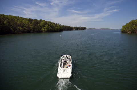 Usher's ex-wife wants to drain Georgia's largest lake, where a boater fatally struck her son