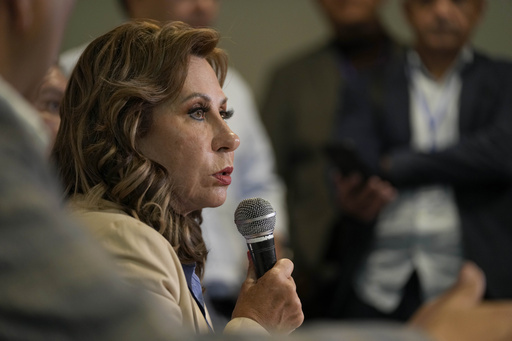 Guatemala's political turmoil deepens as 1 candidate is targeted and the other suspends her campaign