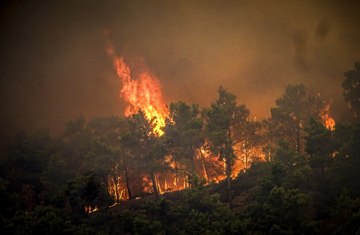 New evacuations ordered in Greece as high winds and heat fuel wildfires