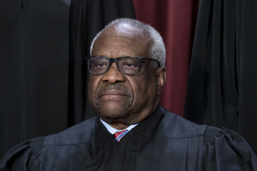 Justice Clarence Thomas reports he took 3 trips on Republican donor's plane last year