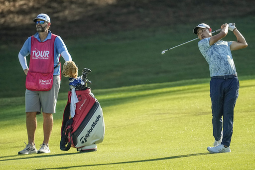 Morikawa breaks Tiger's 36-hole mark at East Lake and shares Tour Championship lead with Hovland