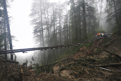 Heavy rains trigger floods and landslides in India's Himalayan region, leaving at least 22 dead