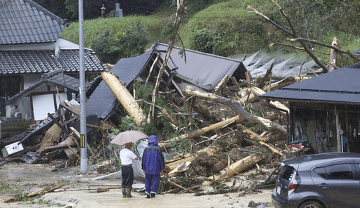 A strong tropical storm is lashing parts of Japan and disrupting holiday travel