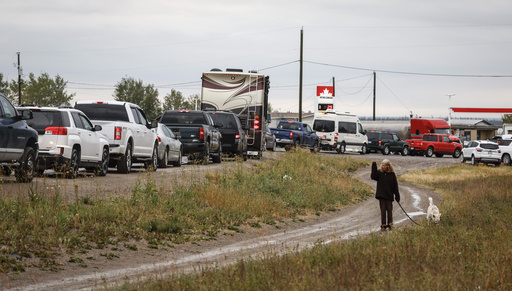 Wildfire nears capital of Canada's Northwest Territories as fleeing residents fill roads and flights