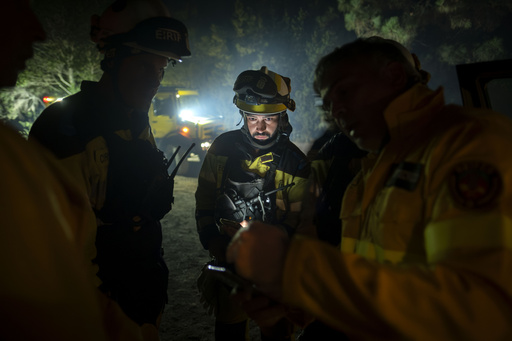 Firefighters battle through the night to halt wildfire in Spain's popular tourist island of Tenerife