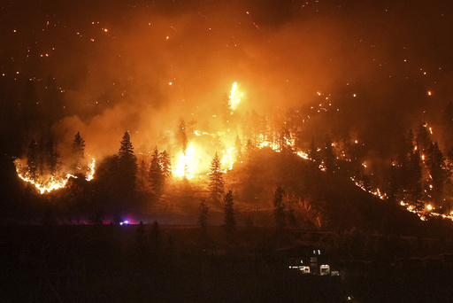 Thousands flee raging wildfire, turning capital of Canada's Northwest Territories into ghost town