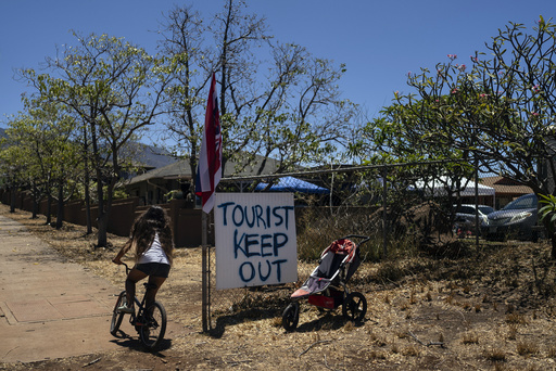 As Maui rebuilds, residents reckon with tourism's role in their recovery