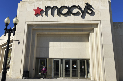 Macy's swings to loss and posts sales decline in 2Q but adjusted results beat Wall Street views