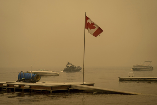 Some wildfire evacuations end in British Columbia, but fire threatens community farther north