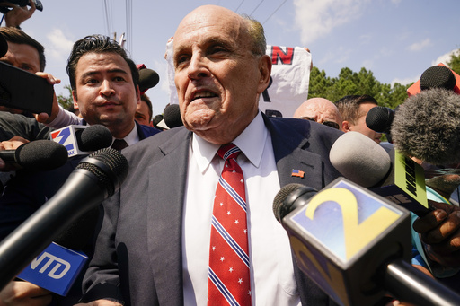 Judge holds Giuliani liable in Georgia election workers' defamation case and orders him to pay fees