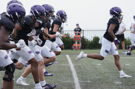 Northwestern athletic director blasts football staffers for 'tone deaf' shirts supporting Fitzgerald