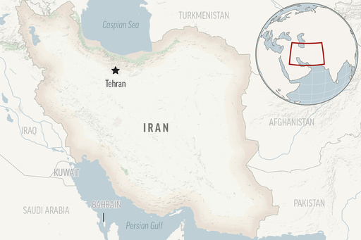 Gunman opens fire at prominent Shiite shrine in southern Iran, wounding at least 4 people