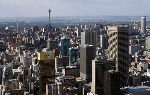 A building marked by fire and death shows the decay of South Africa's 'city of gold'