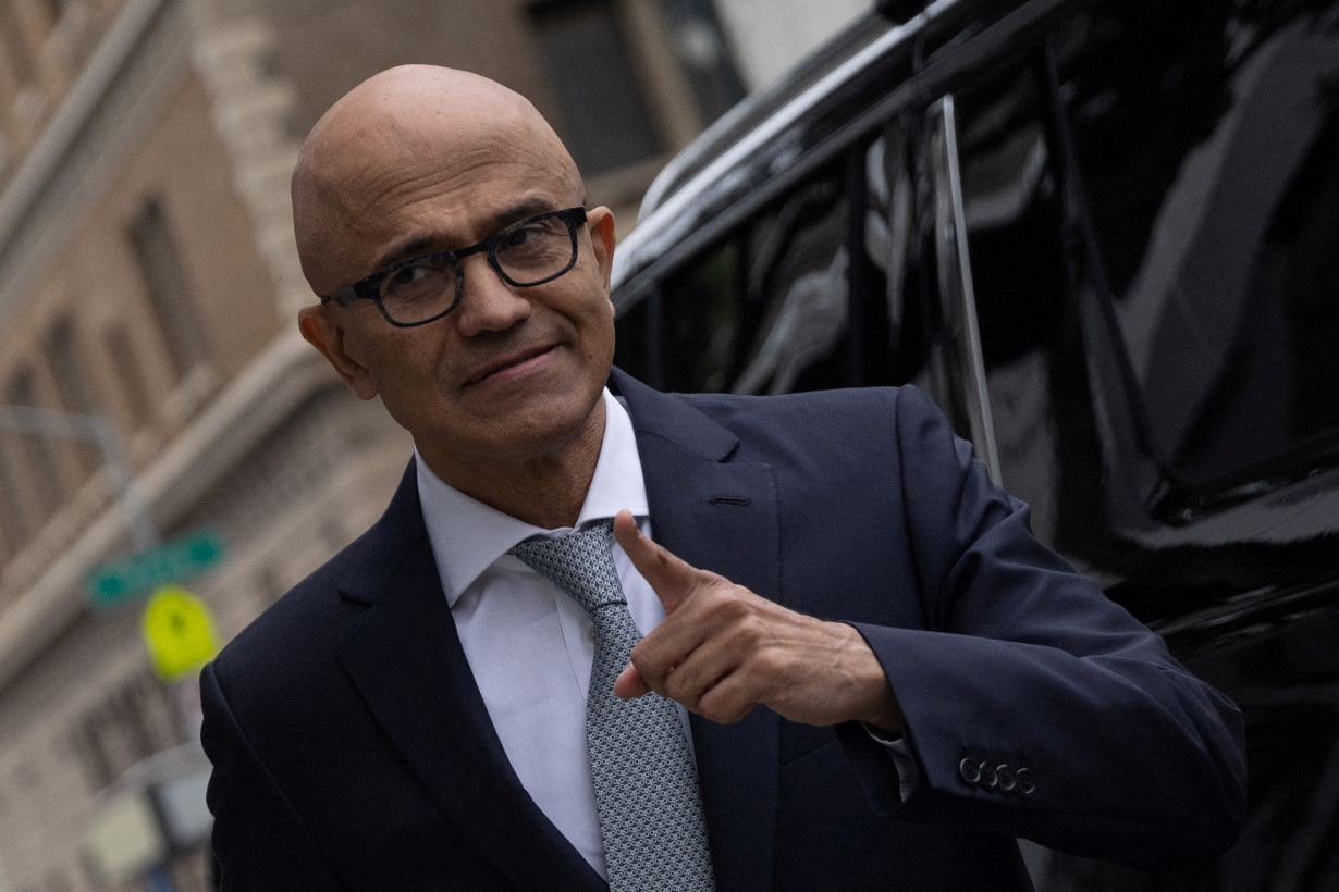 FILE PHOTO: Chief Executive Officer of Microsoft Corporation Satya Nadella arrives to testify at the northern district of California, in Downtown San Francisco