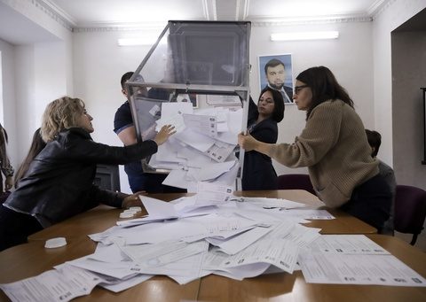 Russia’s election commission says the ruling party wins the most votes in occupied Ukrainian regions