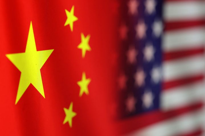 Illustration shows U.S. and Chinese flags
