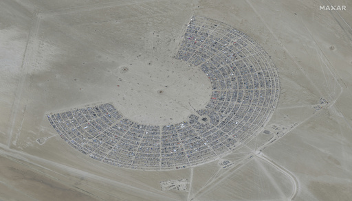 Thousands told to shelter in place at Burning Man fest in Nevada with access closed due to flooding