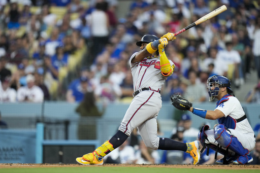 Acuña homers in 3rd straight game against Dodgers as Braves win 4-2 in 10 for 6th in a row