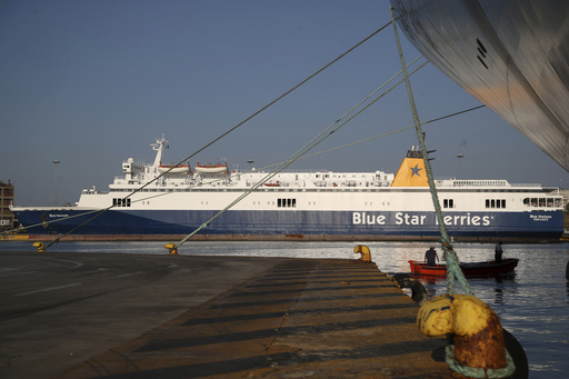 Greek ferry captain, 3 seamen charged over death of tardy passenger pushed into sea by crew member