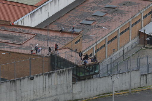 An explosion in Ecuador is seen as gangs asserting power after inmates take hostages