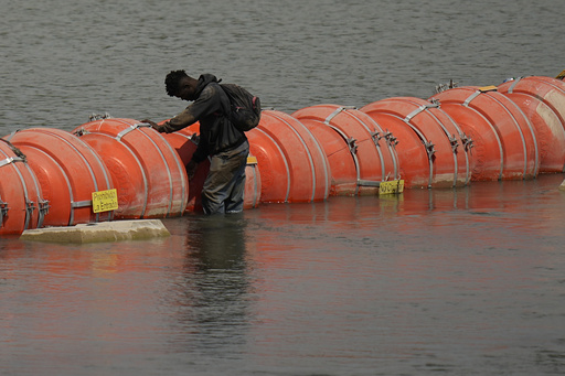 Court order allows Texas' floating barrier on US-Mexico border to remain in place for now