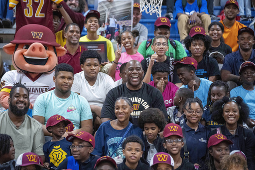 Magic Johnson, Josh Harris and other new Commanders owners introduce themselves to Washington fans