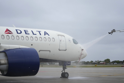 Delta Air Lines employees work up a sweat at boot camp, learning how to de-ice planes