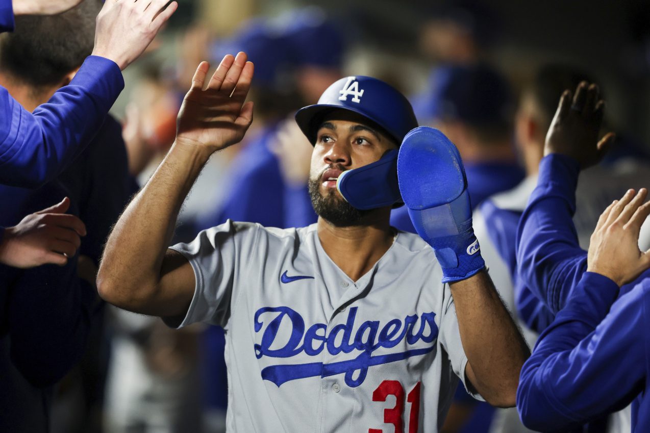 Dodgers wrap up NL West title for 10th time in 11 years with 6-2 win over Mariners in 11 innings