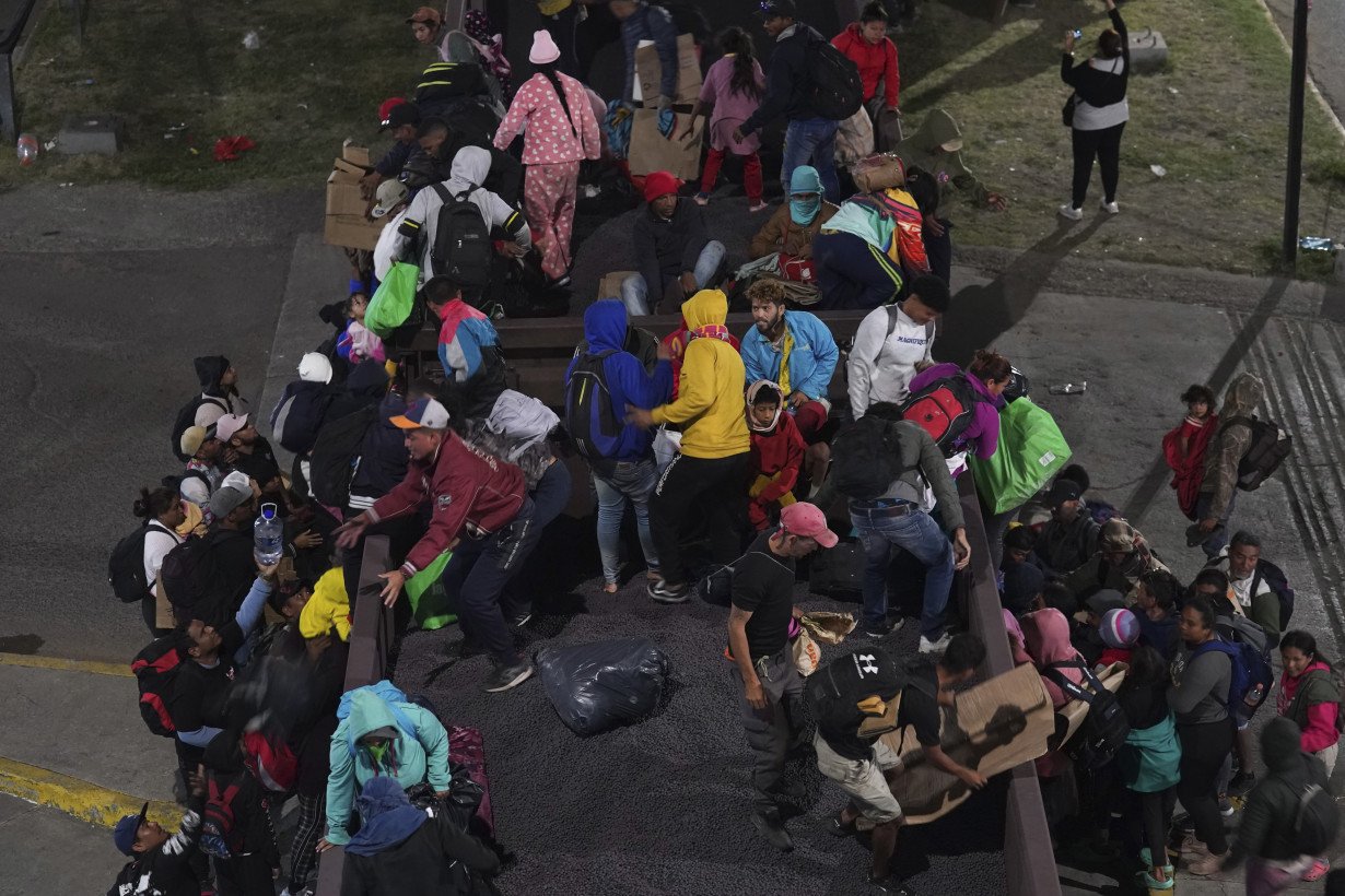 Migrants hoping to reach US continue north through Mexico by train amid historic migration levels