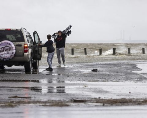 Southern East Coast hit by flooding as Ophelia weakens to tropical depression and moves north