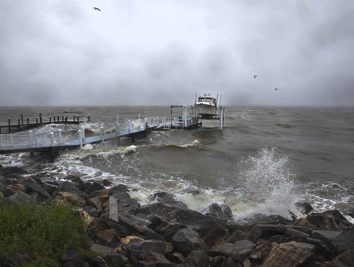 Southern East Coast hit by flooding as Ophelia weakens to tropical depression and moves north