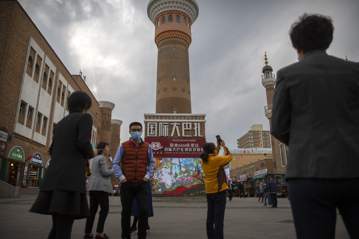 A court in China sentences a famed Uyghur scholar to life in prison, foundation says