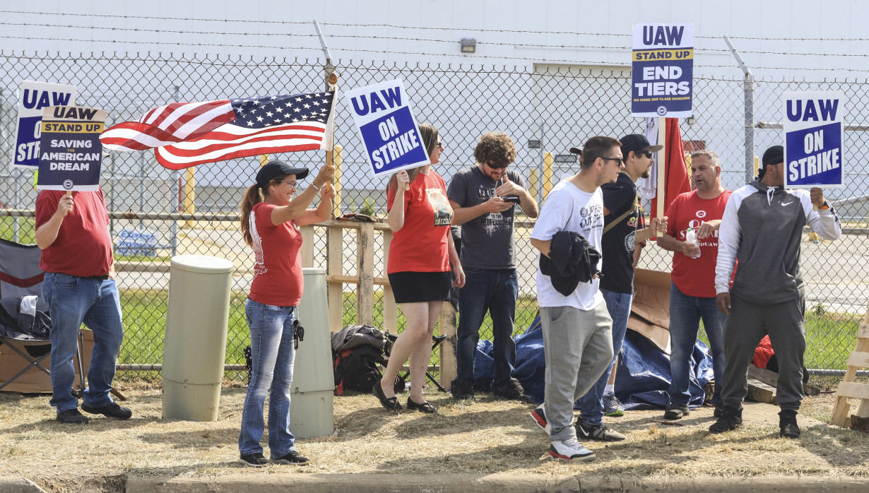 Auto workers expand their strike to 38 locations in 20 states. Biden plans visit to show support