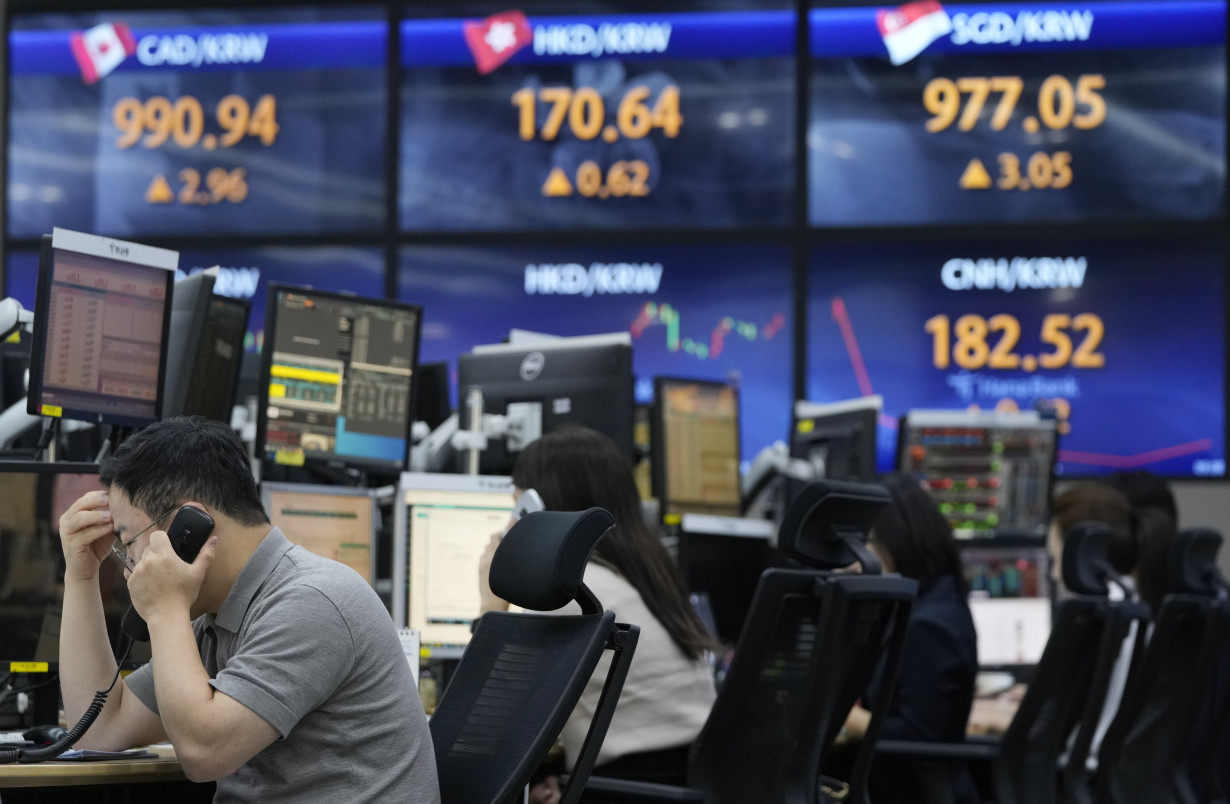 Stock market today: Asian shares mixed after interest rates-driven sell-off on Wall Street