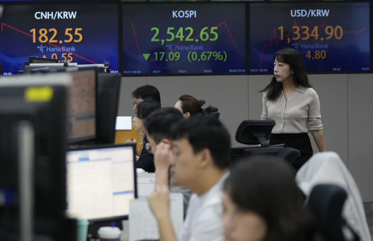 Stock market today: Asian shares mixed after interest rates-driven sell-off on Wall Street