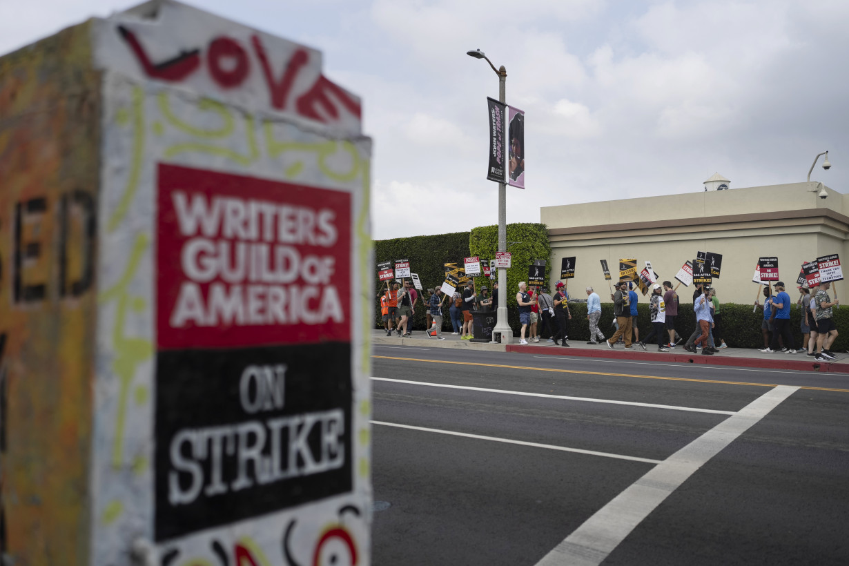 An end in sight? Striking writers and Hollywood studios spend second full day in negotiations