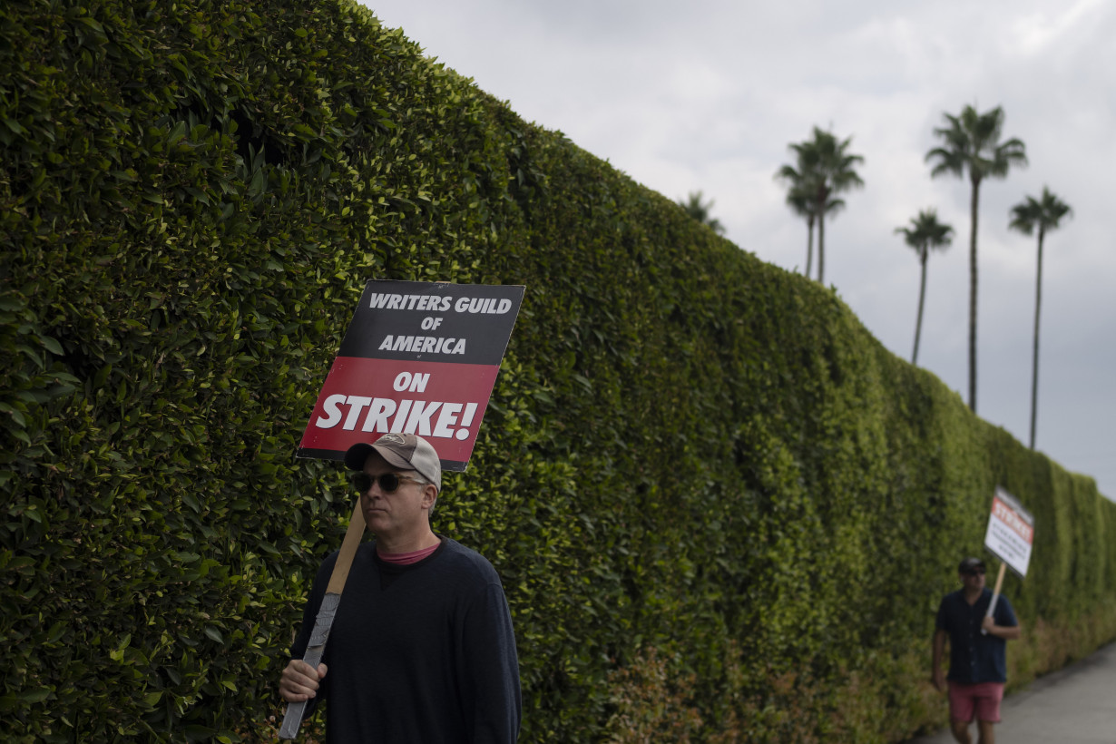 An end in sight? Striking writers and Hollywood studios spend second full day in negotiations