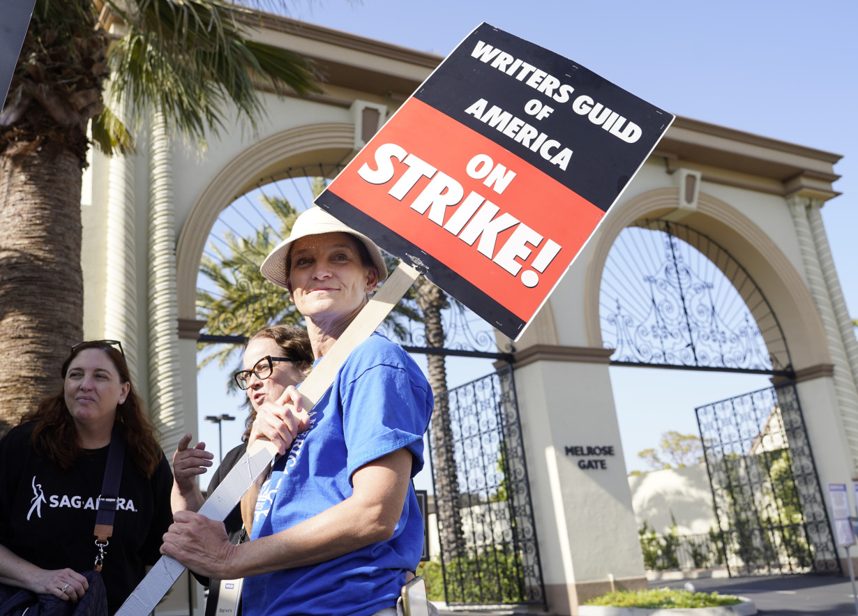 An end in sight? Striking writers and Hollywood studios spend second full day in negotiations