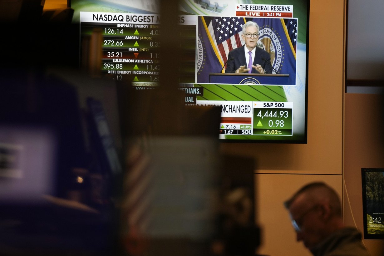 Stock market today: Asian shares track Wall Street's slump after Fed says rates may stay high in '24