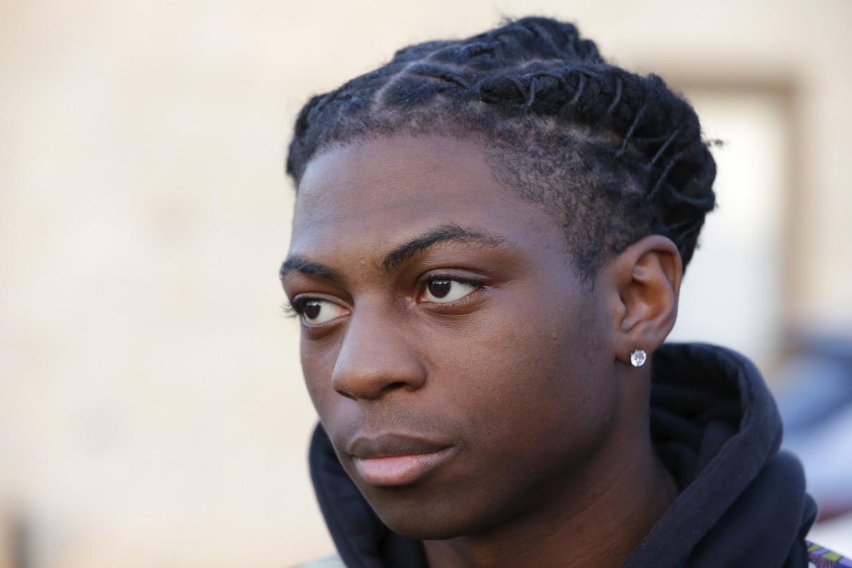 Debate over a Black student's suspension over his hairstyle in Texas ramps up with probe and lawsuit