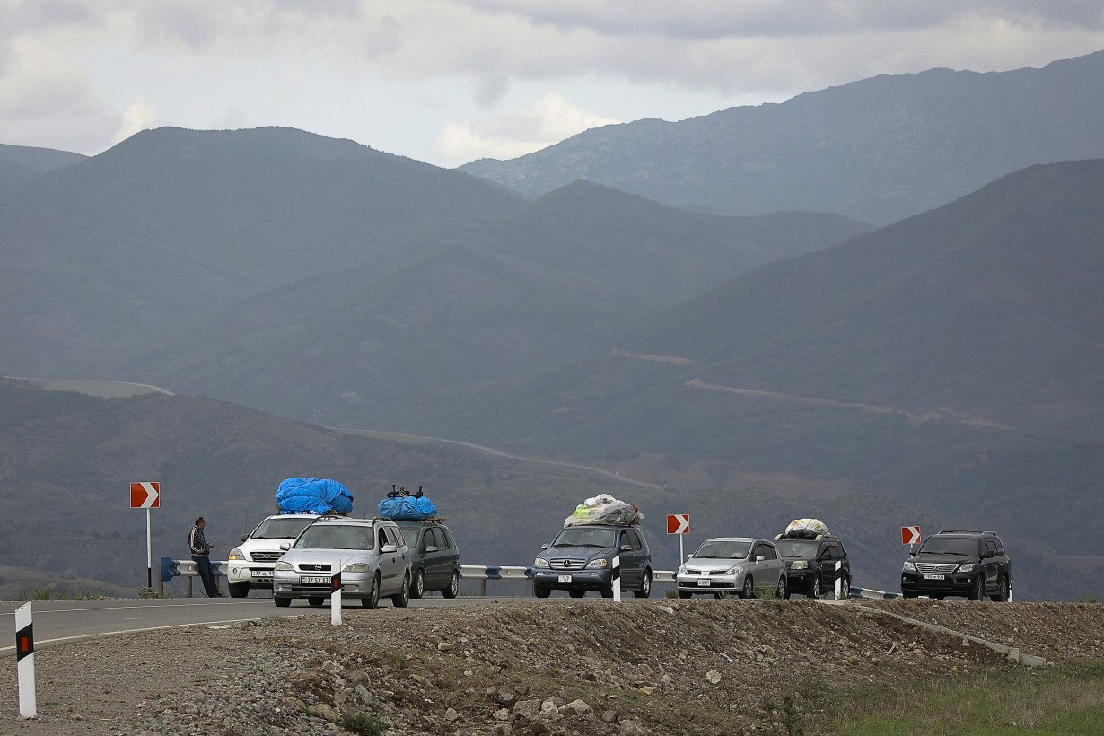 Exasperated residents flee Nagorno-Karabakh after Azerbaijan seizes control of breakaway region