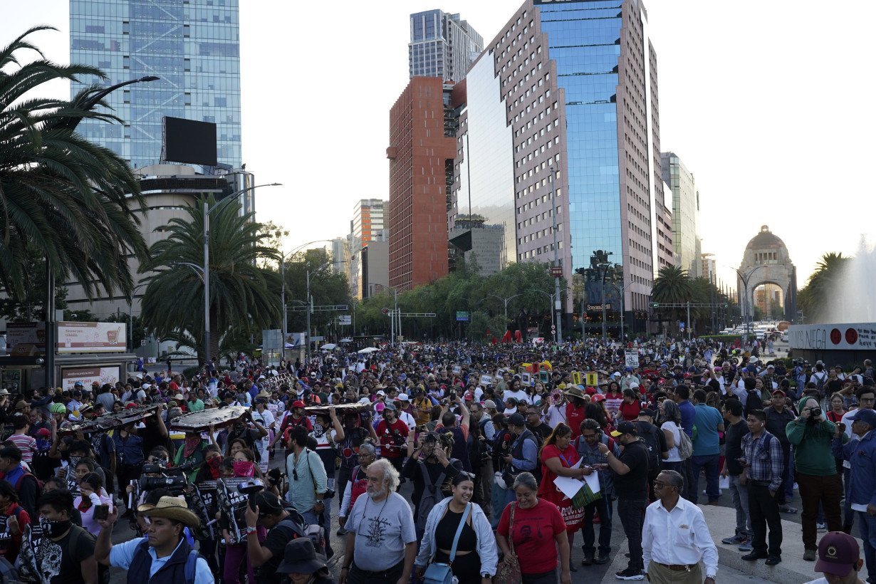 9 years later, families of 43 missing Mexican students march to demand answers in emblematic case