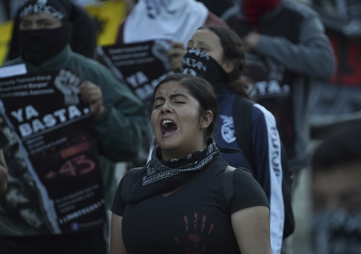 9 years later, families of 43 missing Mexican students march to demand answers in emblematic case