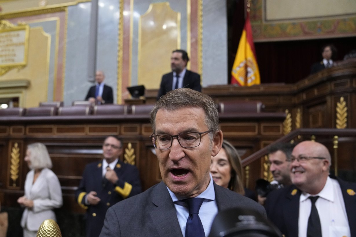 Leader of Spain's conservatives loses his first bid to become prime minister and will try again