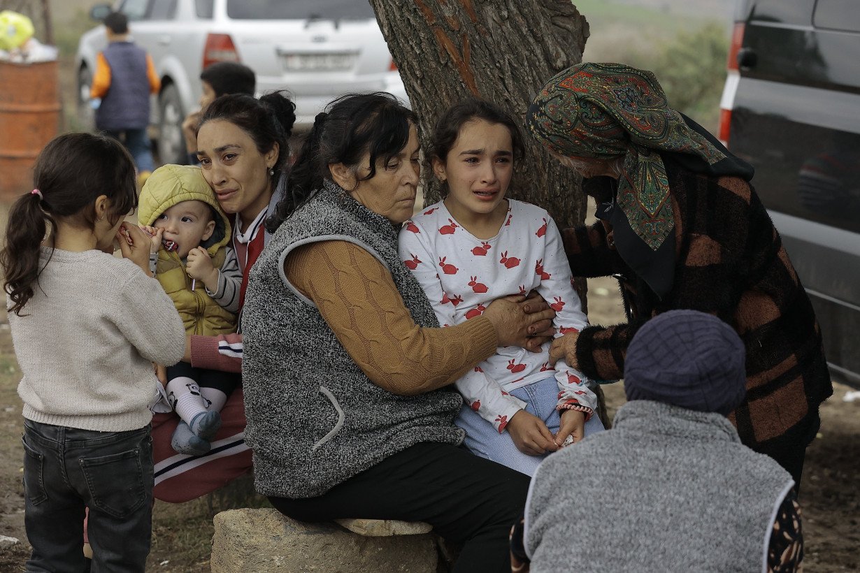 Over half of Nagorno-Karabakh's population flees as the separatist government says it will dissolve