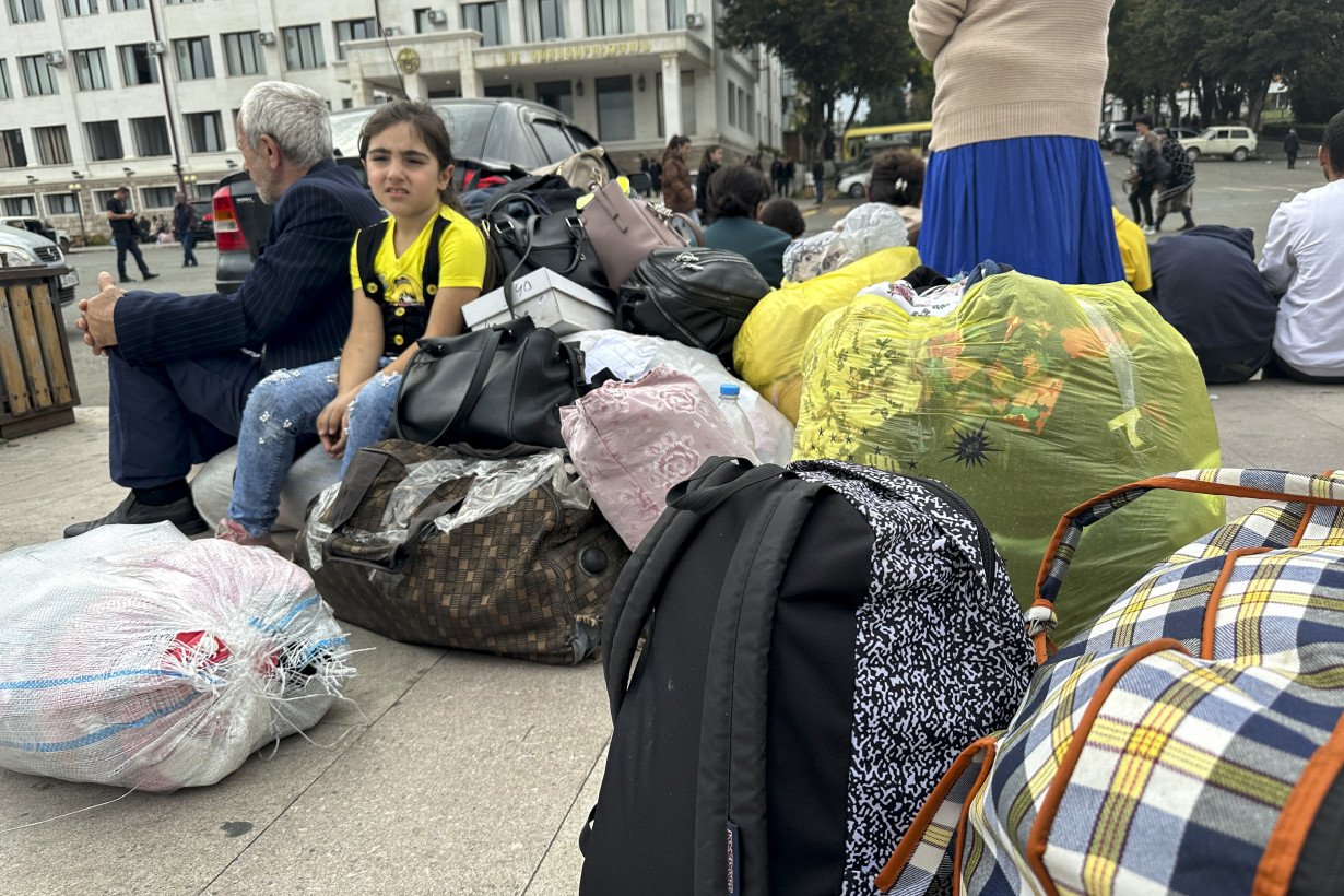 Over half of Nagorno-Karabakh's population flees as the separatist government says it will dissolve