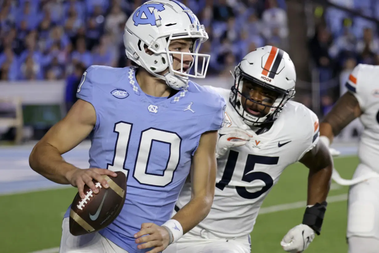 Mike Hollins and Malik Washington help Virginia stun No. 10 North Carolina 31-27